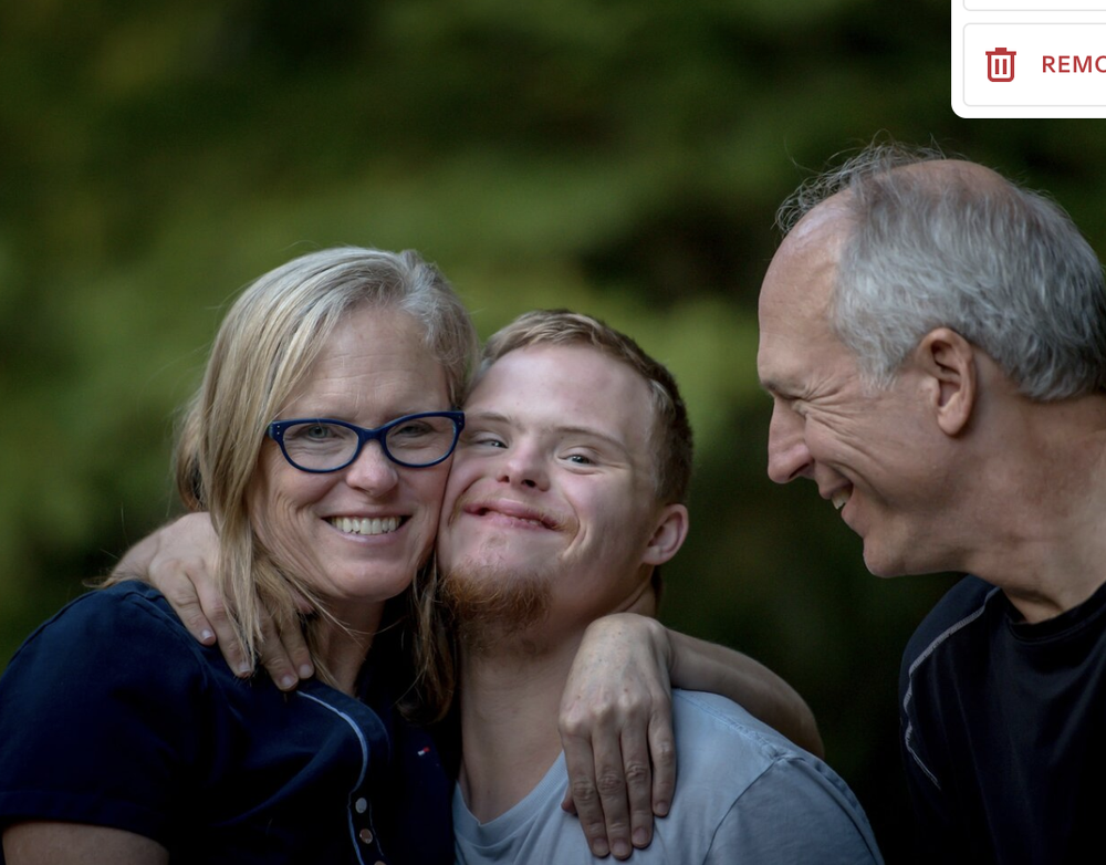 Karen pictured outdoors with her family